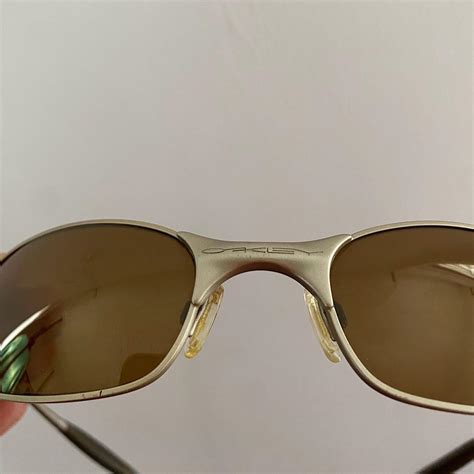 Oakley A Wire 2.0 platinum frame and gold iridium... - Depop