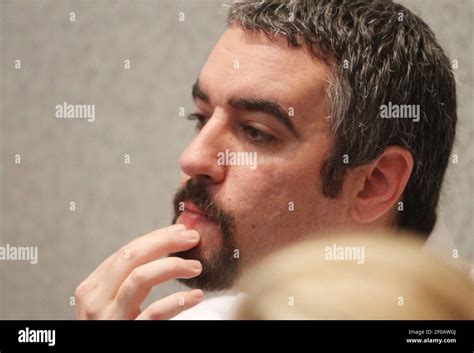 Lee Anthony listens as his mother Cindy Anthony testifies during the ...