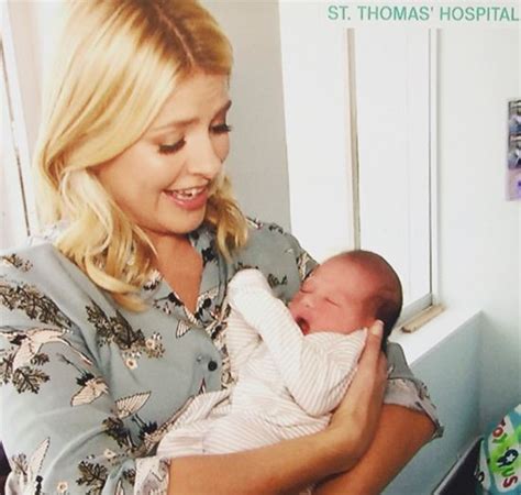 Holly Willoughby cuddles newborn babies on maternity ward | HELLO!