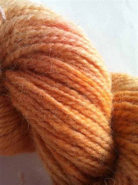 Karakul Orange Kremesickle. Sheep wool handspun yarn hand dyed