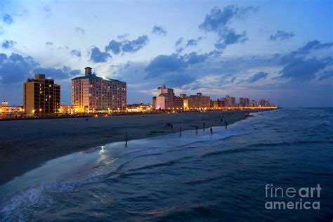 Virginia Beach oceanfront at dusk Photograph by Bill Cobb - Fine Art America