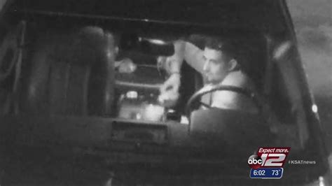 Caught on camera: Car thief rummages through victim's vehicle