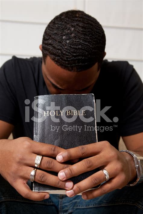 Man Praying With His Bible Stock Photo | Royalty-Free | FreeImages