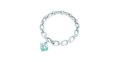 Tiffany Blue Box™ charm in sterling silver with enamel finish on a bracelet. | Tiffany & Co.