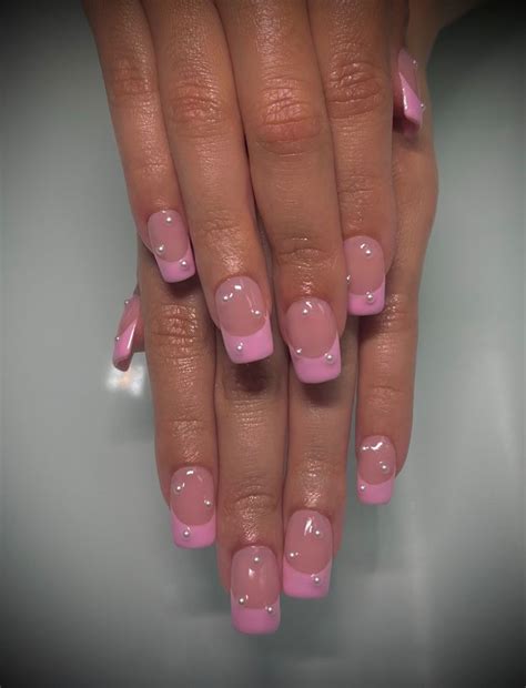 Pink nails with pearls | Pearl nails, Pink french nails, Acrylic nail set