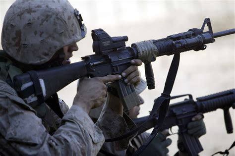 A U.S. Marine armed with an M16A4 rifle and ITL MARS sight in 2004. [2 ...