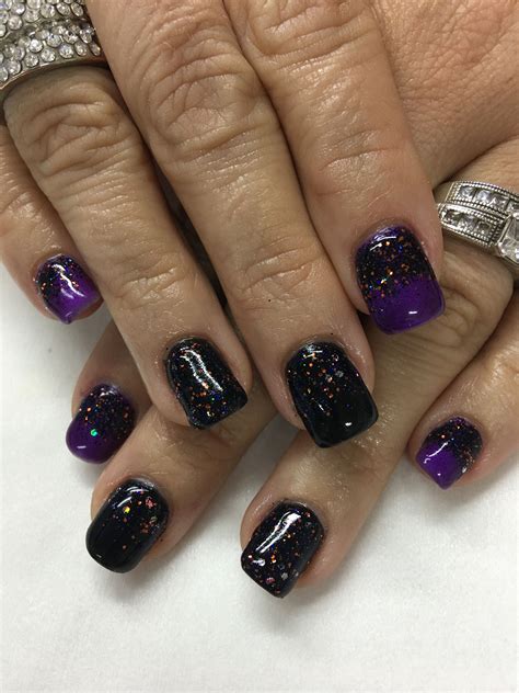 Make A Bold Statement With Black And Purple Nails – The FSHN