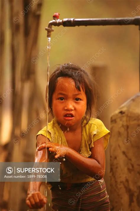 Village Child Bathing Sainyabuli Province, northwest Laos - SuperStock