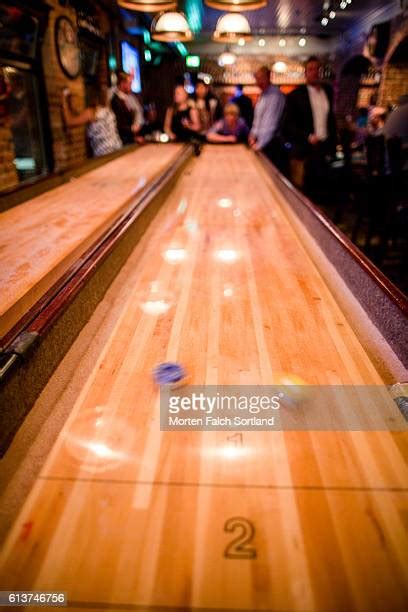 Table Shuffleboard Pucks Photos and Premium High Res Pictures - Getty Images