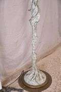 Bronze floor lamp of a woman holding leaf; 68-4418 - R.H. Lee & Co. Auctioneers