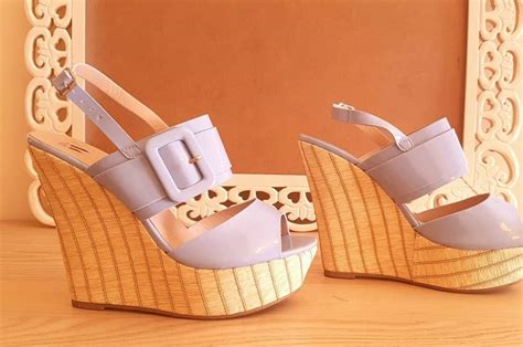 Buy Leather wedge sandals + great price - Arad Branding