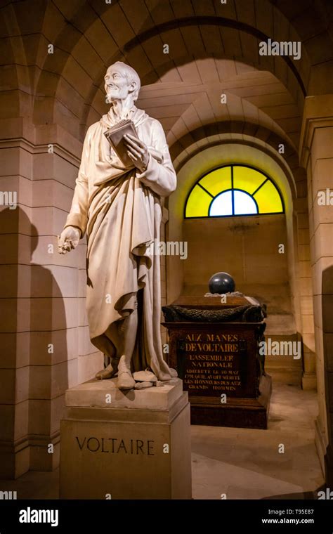 Paris, France - 24.04.2019: Voltaire's tomb and statue in the crypt of ...