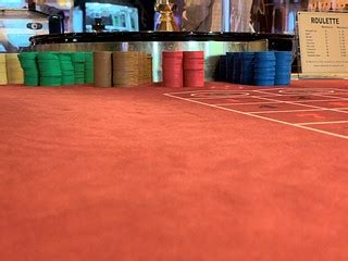 Casino chips on a Roulette table | Casino chips in the backg… | Flickr