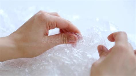 ASMR, Woman Presses Plastic Bubble Wrap As a Stress Relief. Popping Bubble Wrap Stock Photo ...