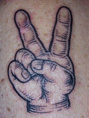 Love and peace sign tattoo - Tattoo designs