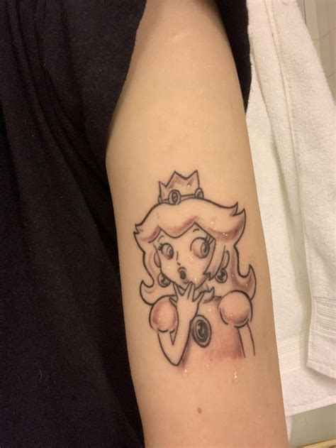 princess peach tattoo skin of a different color IL (i forgot the artists name im sorry) i got ...