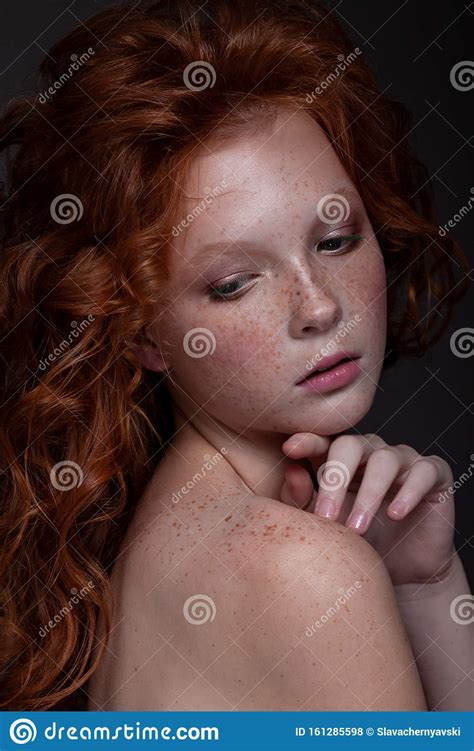 Red-haired Teenager Girl In A Studio In The Fall Scenery With Yellow Leaves Royalty-Free Stock ...