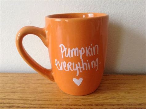 Hand painted orange coffee/tea mug that says pumpkin everything with white writing. Perfect for ...