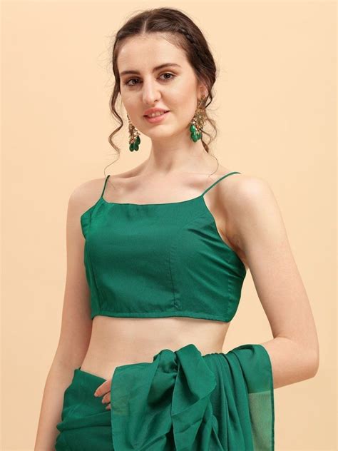 Enticing green solid ruffled saree with belt online for women which is crafted from silk blend ...