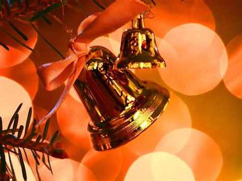 Download Christmas Bell Peach Sparkles Wallpaper | Wallpapers.com
