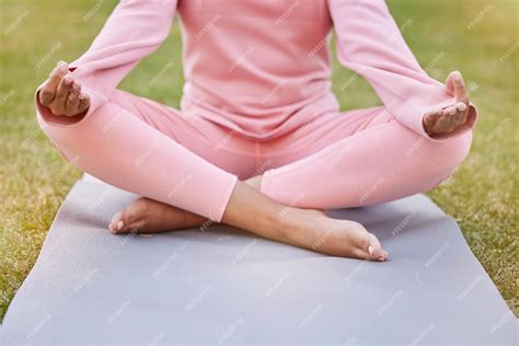 Premium Photo | Meditation grass and body of woman in lotus yoga ...