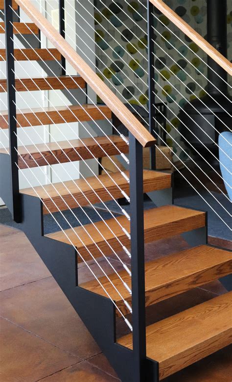 Modern Sawtooth Floating Stairs | Stair railing design, Modern stair railing, Modern stairs