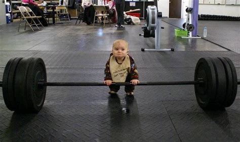 Kid Fails at Weight Lifting