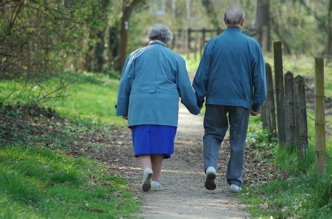 Older couple holding hands | Ferguson Values
