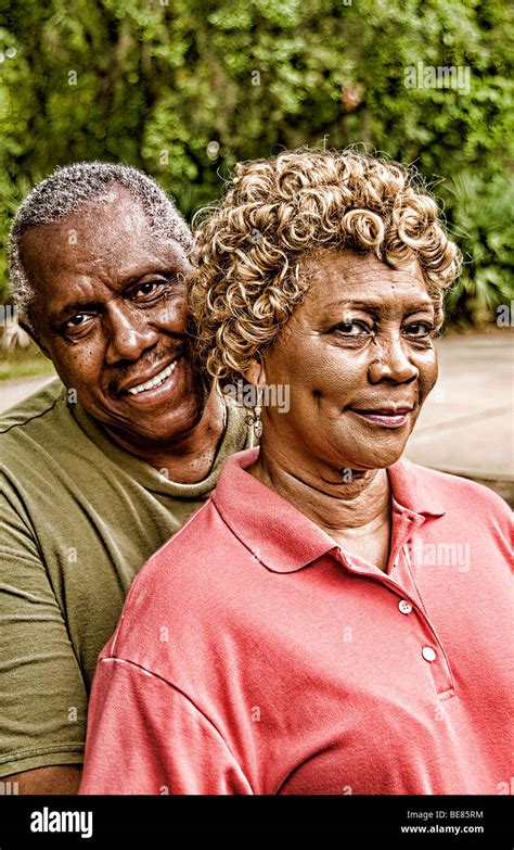 Retired senior black african american couple portrait as they hug ...