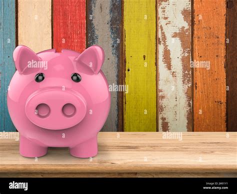 3d rendering piggy bank on wooden counter Stock Photo - Alamy