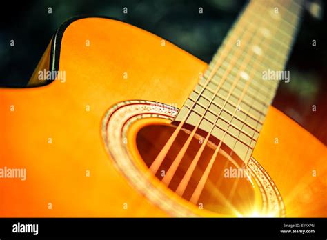 Acoustic Wooden Guitar Closeup Photo. Guitar Playing Concept Stock Photo - Alamy