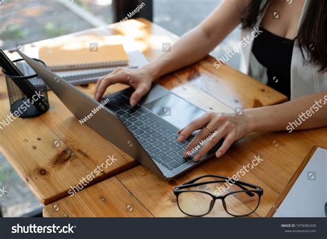 Close Females Hand Typing On Laptop Stock Photo 1978485440 | Shutterstock