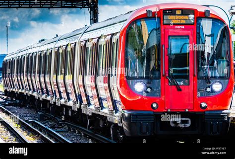 London Underground S Stock District line train towards Ealing Broadway station Stock Photo - Alamy