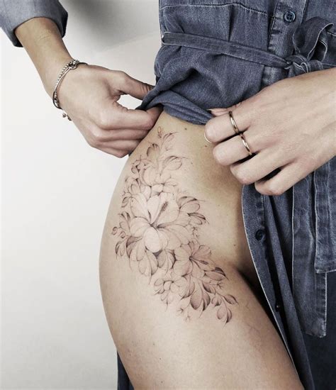 Floral Hip in 2021 | Petite tattoos, Hip tattoo designs, Hand and ...