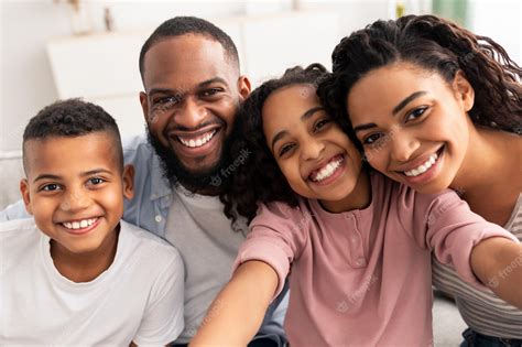 Premium Photo | Portrait of african american family taking a selfie ...