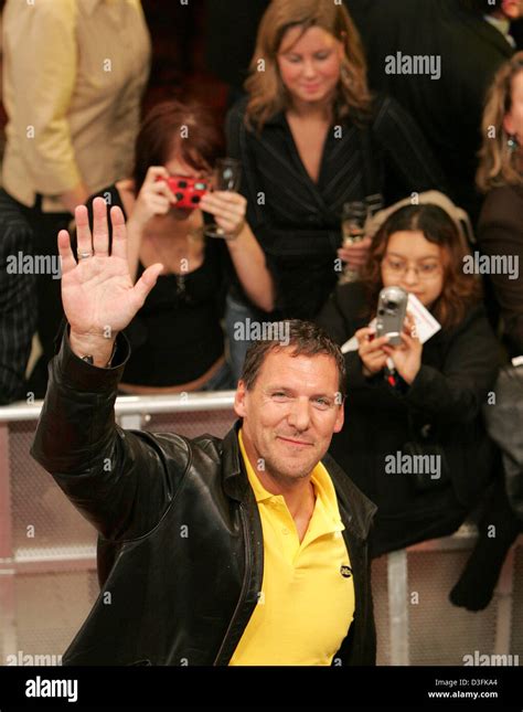 (dpa) - German actor Ralf Moeller waves to the audience prior to the ...