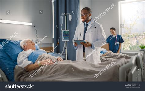 Hospital Ward Friendly Black Doctor Talks Stock Photo 1940771311 | Shutterstock