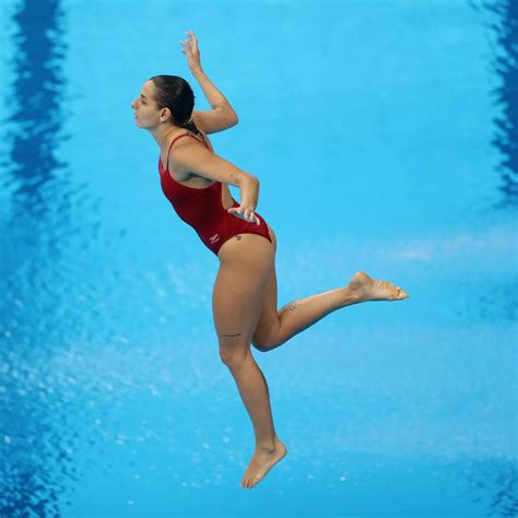 Olympic Diving Into A Pool