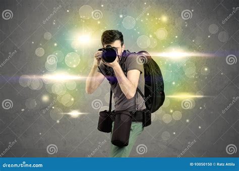 Photographer with Flashing Lights Stock Photo - Image of camera ...