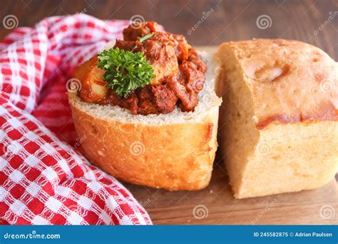 Bunny Chow Filled with Chicken Curry Stock Image - Image of cuisine, chow: 245582875