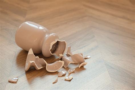 Broken Pink Ceramic Vase on Wooden Floor Stock Image - Image of ceramic ...