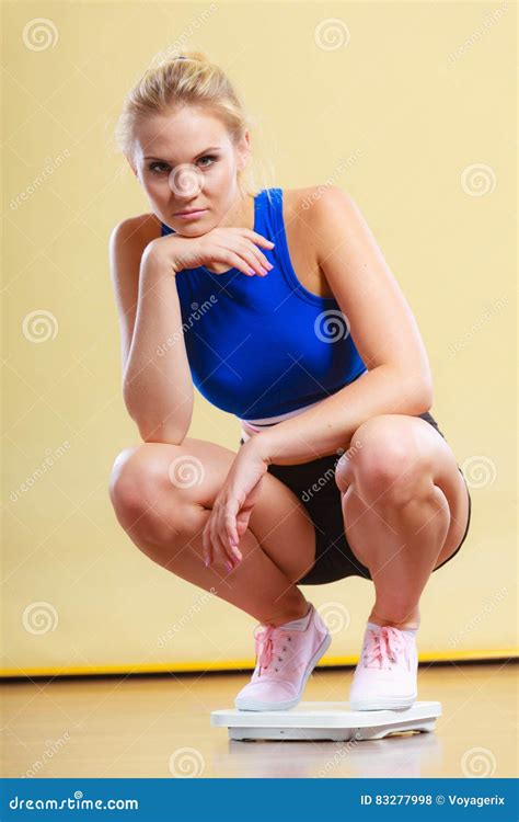 Upset Sporty Woman on Weight Scale. Stock Photo - Image of weightloss, fitness: 83277998