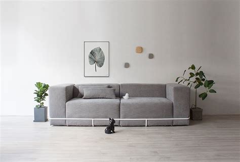 A Minimalist Sofa Held Together with a Frame