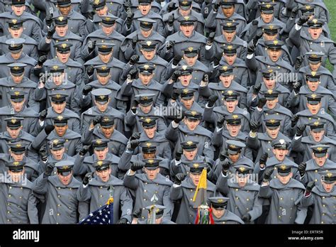 US Army West Point cadets in winter uniform cheer for his team during the 115th Army-Navy ...