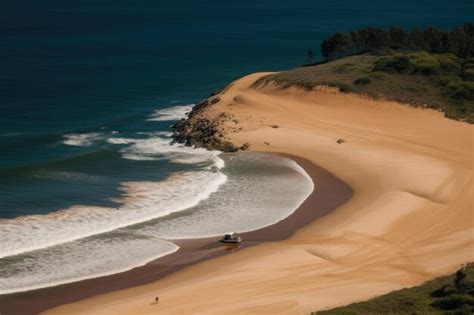 Premium AI Image | An aerial view of a beach with a boat in the water