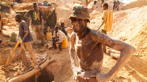 Artisanal mining in Africa photos of mining pits by Hugh Brown