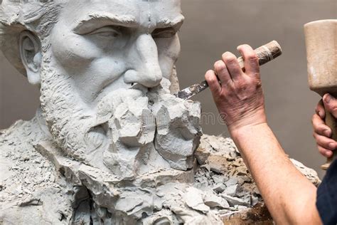 Sculptor carving. Sculptor working on gypsum bust, sculpture , # ...