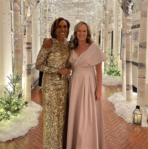 GMA’s Robin Roberts stuns in gold cut-out gown with partner Amber for ...