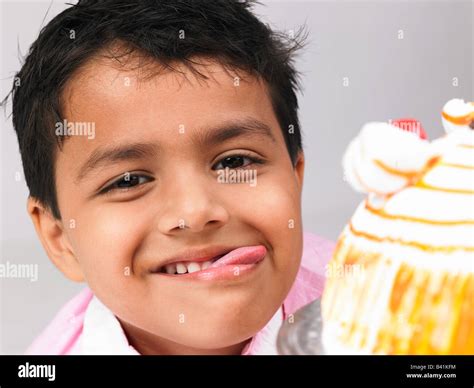 asian boy biting his lips Stock Photo - Alamy