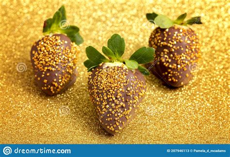 Chocolate Covered Strawberries with Sprinkles on a Golden Glittery ...